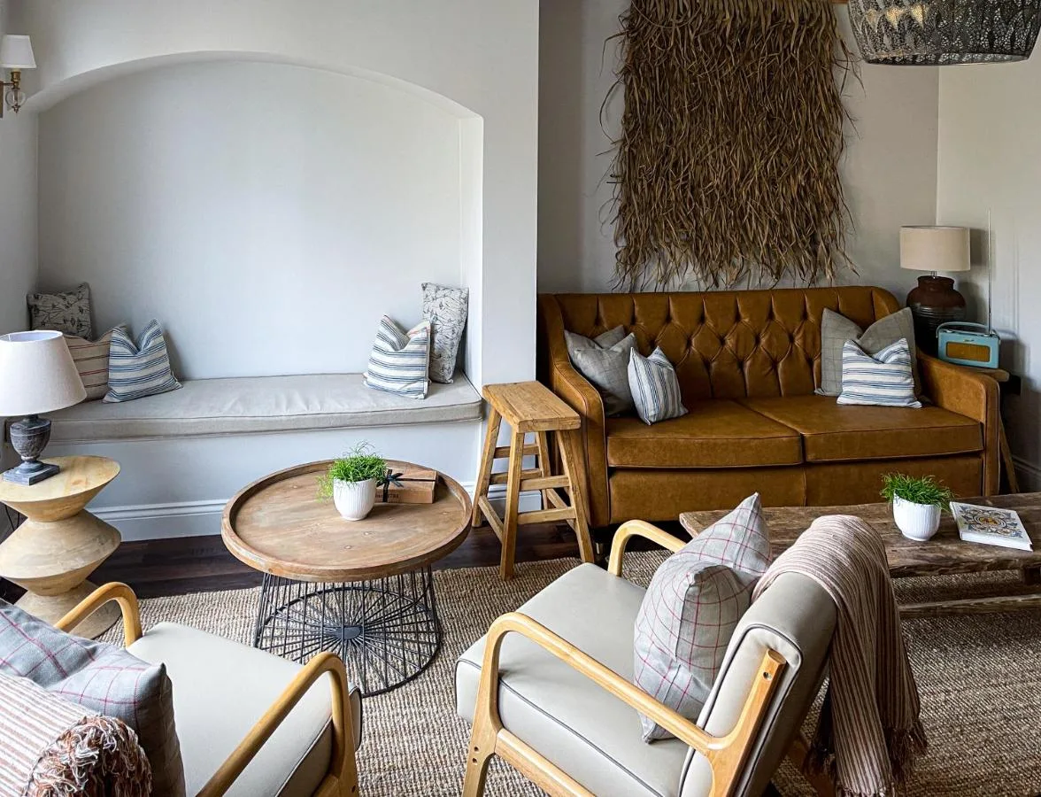 a living room with a couch and a table at Parador 44 in Cardiff